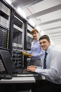 Network administrators in a server room